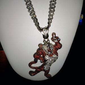 Brass chain with cz diamonds and Tony the tiger charm
